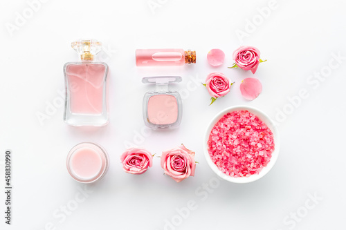 Pink roses cosmetic set with aroma oil and flower perfume