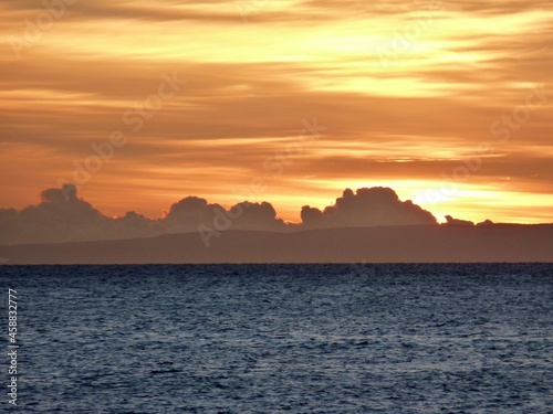 sunset over the sea in honolulu hawaii 