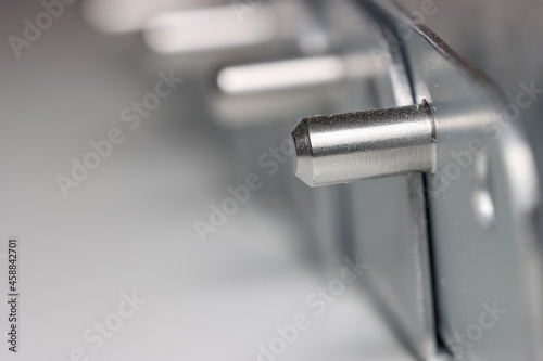 Close up shot of metal brackets with metal studs