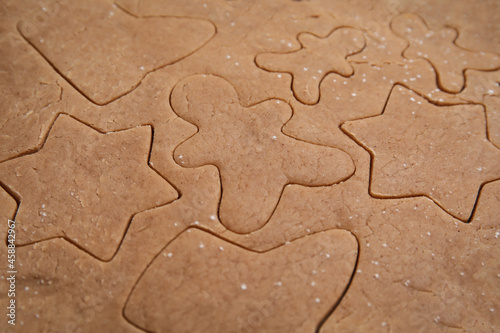 Making Christmas cookies. Raw dough as background, closeup