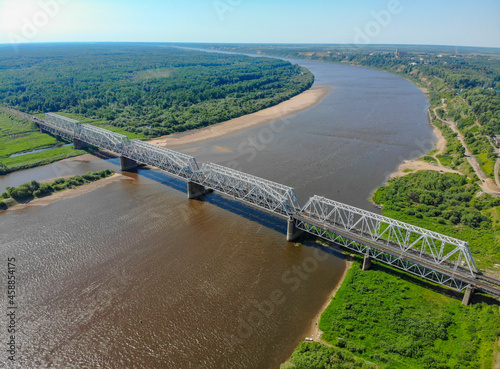 Aerial view of the railway bridge over the Vyatka river (Kotelnich, Kirov region, Russia) photo