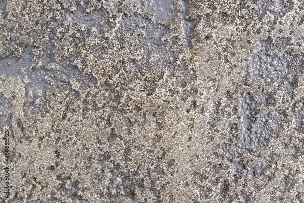 Surface of porous ice is gray. Wet ice backdrop concept. Surface of porous ice is gray. Wet ice backdrop concept.
