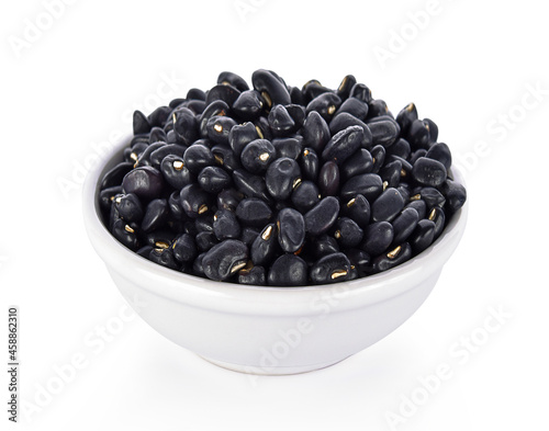 black beans in white bowl on white background