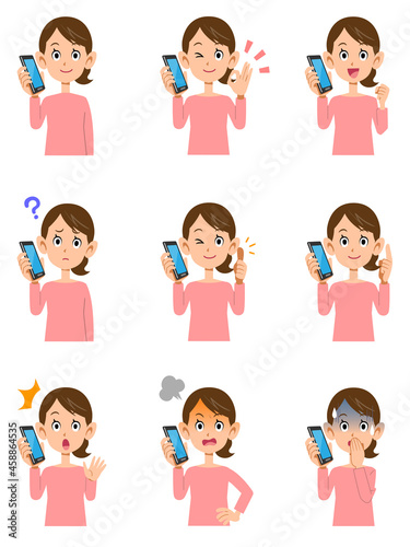 携帯電話で会話しているピンクのカットソーを着た女性の9種類の仕草と表情

