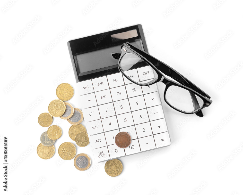 Coins with calculator and eyeglasses on white background Coins with calculator and eyeglasses on white background