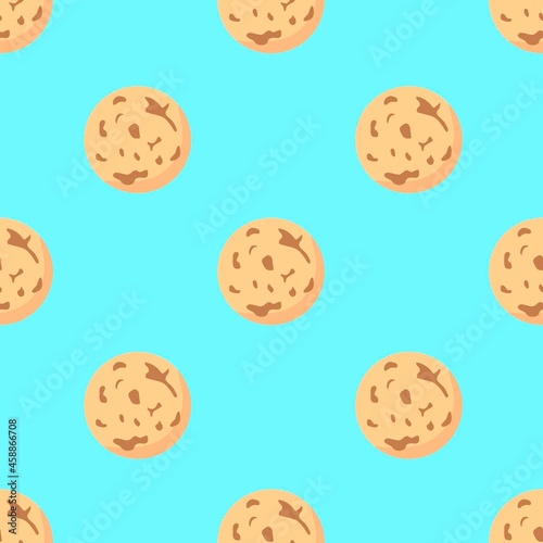 Simple vector seamless pattern. Small gingerbread cookies on a light blue background. Traditional sweet pastries.