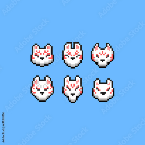 Pixel art set of japanese fox mask icon.