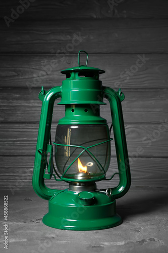 Stylish retro lamp on grey ...