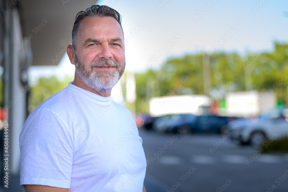 Fototapeta premium Confident attractive athletic senior man with beard