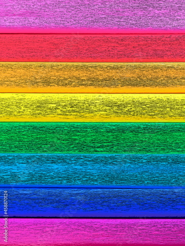 Pride Flag by Gilbert Baker. Symbol of the overall LGBTQ LGBTI community. Crepe paper is available in pink, red, orange, yellow, crepe, blue, purple and magenta. Colorful background for Pride events photo