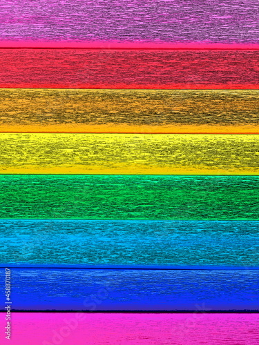 Pride Flag by Gilbert Baker. Symbol of the overall LGBTQ LGBTI community. Crepe paper is available in pink, red, orange, yellow, crepe, blue, purple and magenta. Colorful background for Pride events photo