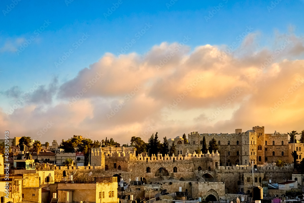 sunrise over Damascus Gate and the ancient rooftops of the old city of jerusalem, israel
