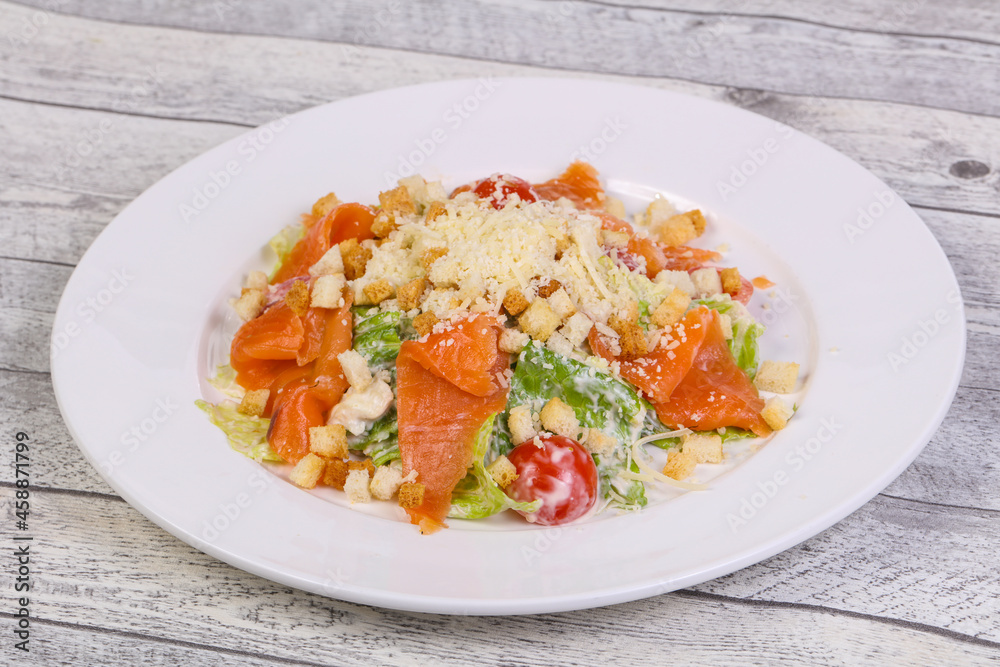 Caesar salad with salmon and parmesan Caesar salad with salmon and parmesan