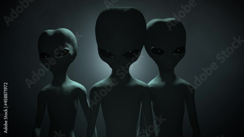 3D CGI VFX close-up of three classic Roswell style grey aliens on a dark backlit background, standing and looking menacingly into the camera, with a smokey, atmospheric environment photo