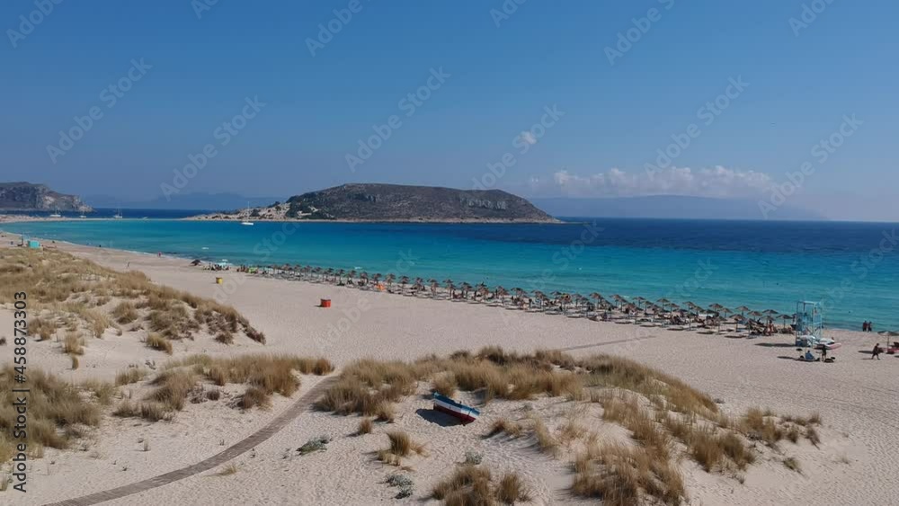 Aerial view of Simos beach in Elafonisos island in Greece. Elafonisos is a small Greek island the Peloponnese with idyllic exotic beaches and crystal clear waters. Laconia, Greece, Europe Aerial view of Simos beach in Elafonisos island in Greece. Elafonisos is a small Greek island the Peloponnese with idyllic exotic beaches and crystal clear waters. Laconia, Greece, Europe