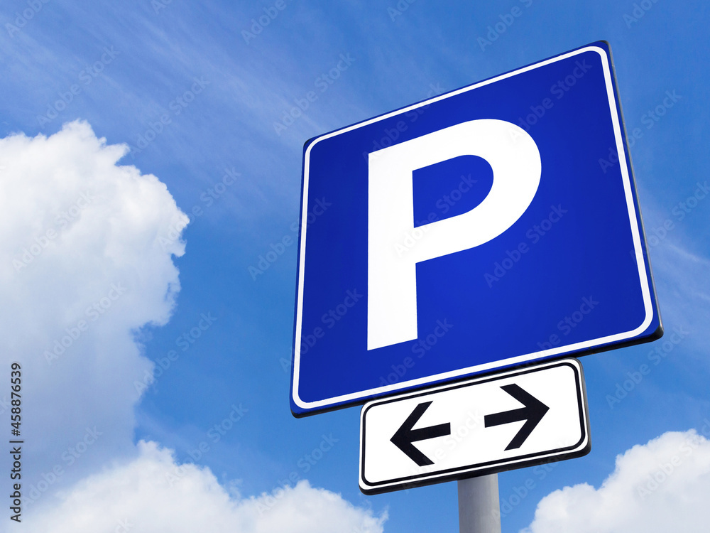 Parking signal with cloudy sky Parking signal with cloudy sky