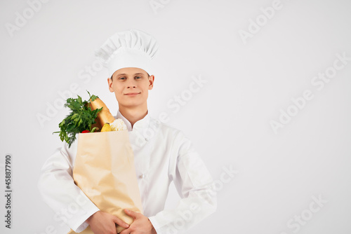 man in chef's clothes food package healthy food kitchen service