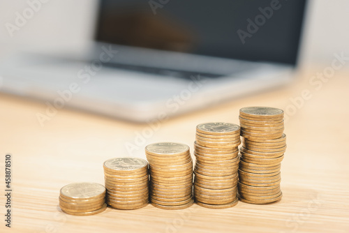 Gold coins stacks is representing riches and wealth management. Coin stack growing and find out the way to get a return on investment. Finance and money exchange investment as concept.	
