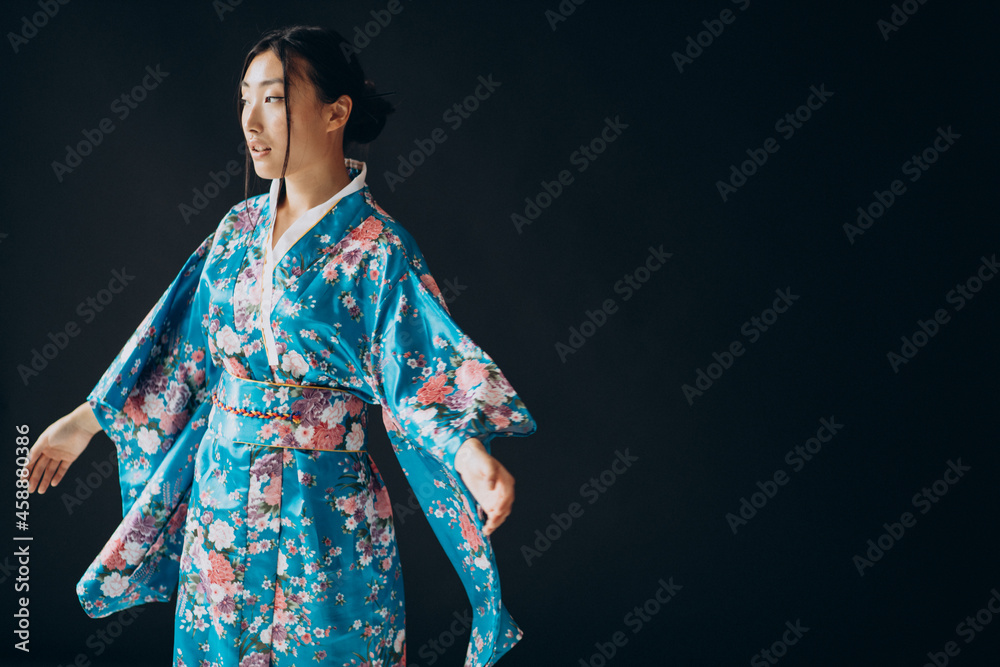 Japanese woman in traditional kimono in studio Japanese woman in traditional kimono in studio