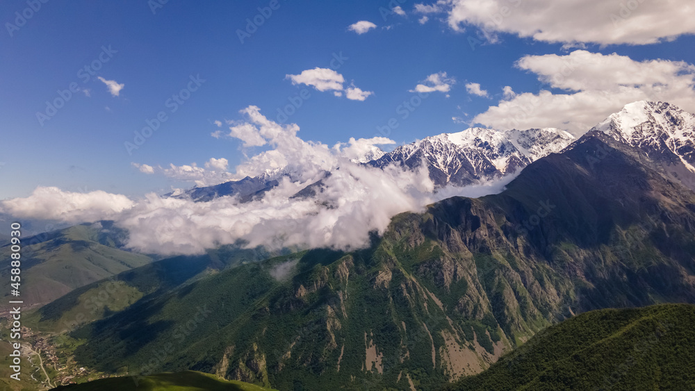 Mountain Ridge of Caucasian Range Partly Covered with Snow. Aerial View