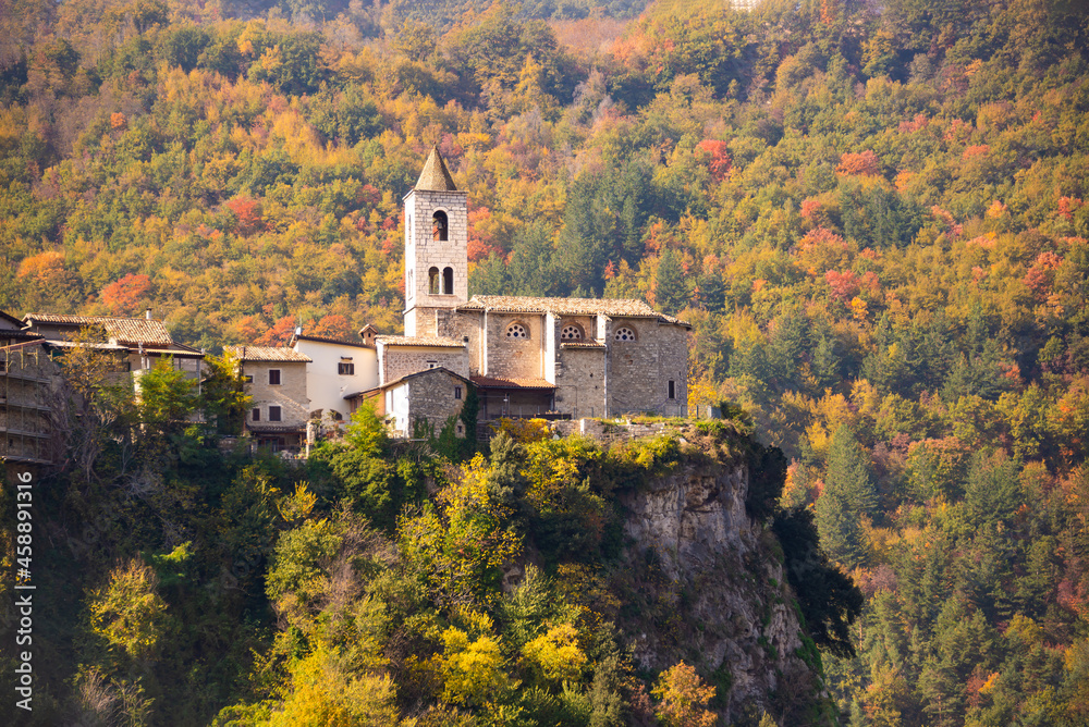 Ancient church on hill in autumn