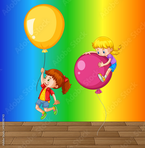 Children playing with balloon on rainbow gradient background
