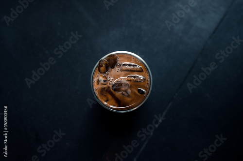 iced coffee served on black table at cafe​