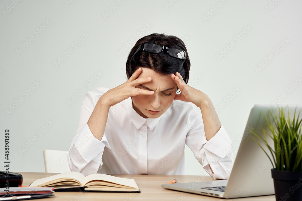 Businesswoman at the desk with glasses self-confidence Studio Lifestyle Businesswoman at the desk with glasses self-confidence Studio Lifestyle