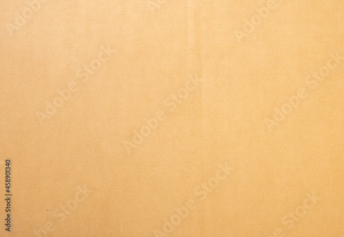 Brown paper texture background of paperboard sheet.