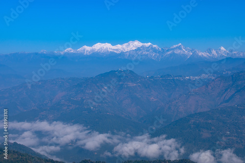 Majestic view of snow capped Sleeping Buddha ( mt. Kanchenjunga and her family ) seen from Sandakphu on a clear winter morning