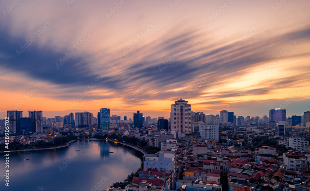 Fototapeta premium Sunset over the city. Hanoi skyline at sunset