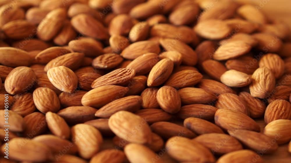 ripe clean walnut almonds close up. background. product rich in minerals and vitamins. Macro. ripe clean walnut almonds close up. background. product rich in minerals and vitamins. Macro.