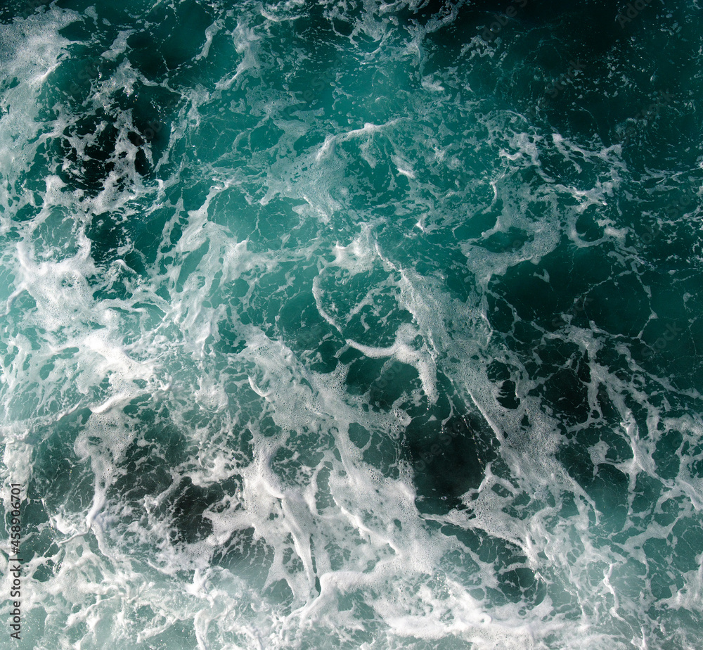 Fototapeta premium Abstract blue sea water with white wave