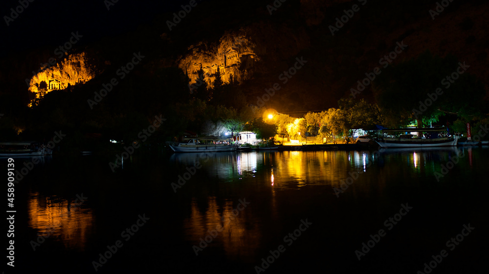 King rock tombs in the ancient city of Kaunos. Dalyan near Iztuzu beach, which is the spawning area of Caretta Caretta. Caunos and Lycian ancient city. Night view.