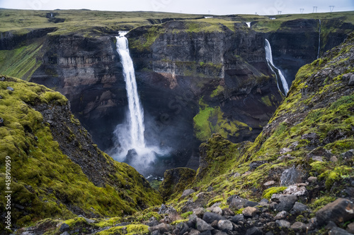 Dramatic landscape of epic Haifoss Waterfall in Landmannalaugar canyon, Iceland