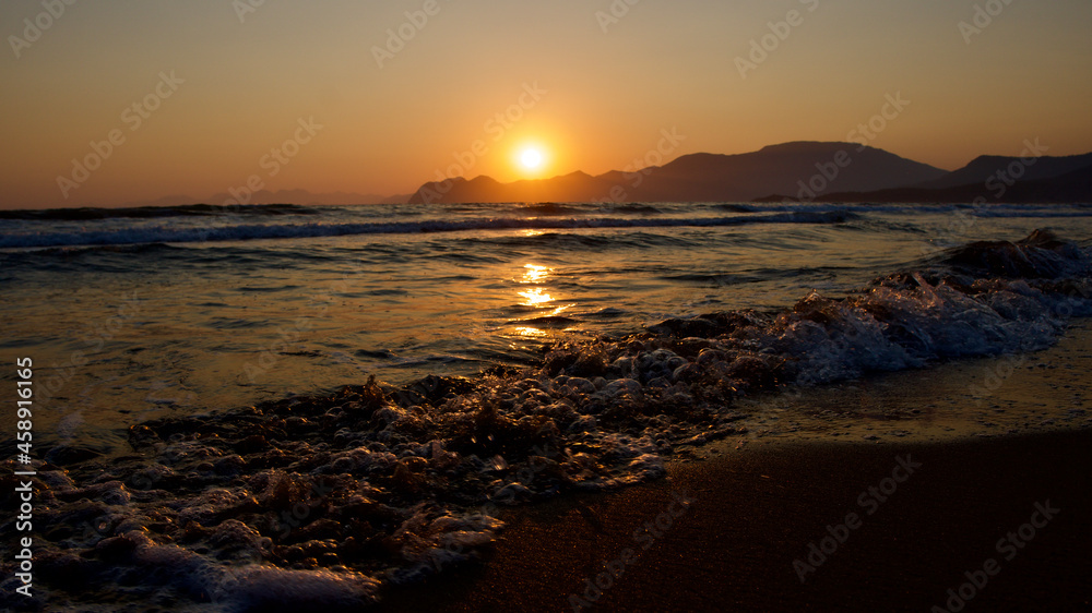 Spawning place of Caretta Caretta turtles: Iztuzu beach. Golden sun rays reflecting off the sea at sunset. Spectacular sunset at the meeting point of the Mediterranean and Aegean.