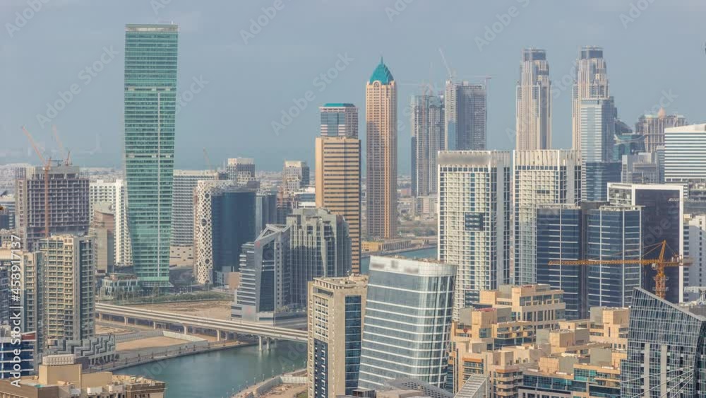 Skyline with modern architecture of Dubai business bay towers timelapse. Aerial view Skyline with modern architecture of Dubai business bay towers timelapse. Aerial view