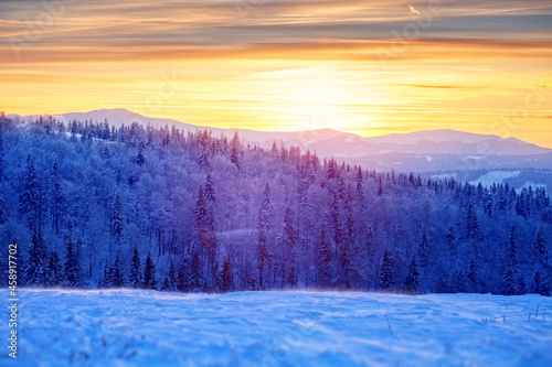 Sunset in mountains, winter landscape