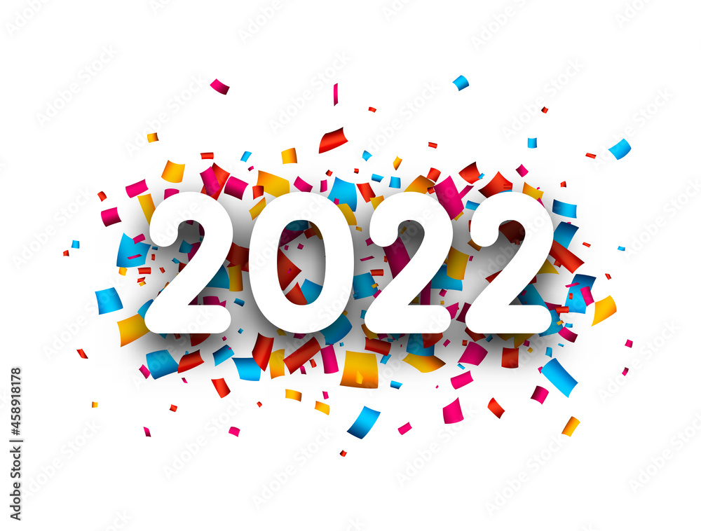 2022 white sign over colourful confetti. 2022 white sign over colourful confetti.