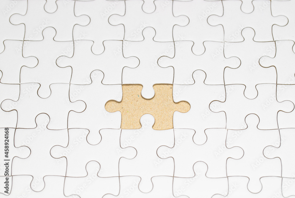 Missing piece of white jigsaw on the white background. Missing piece of white jigsaw on the white background.