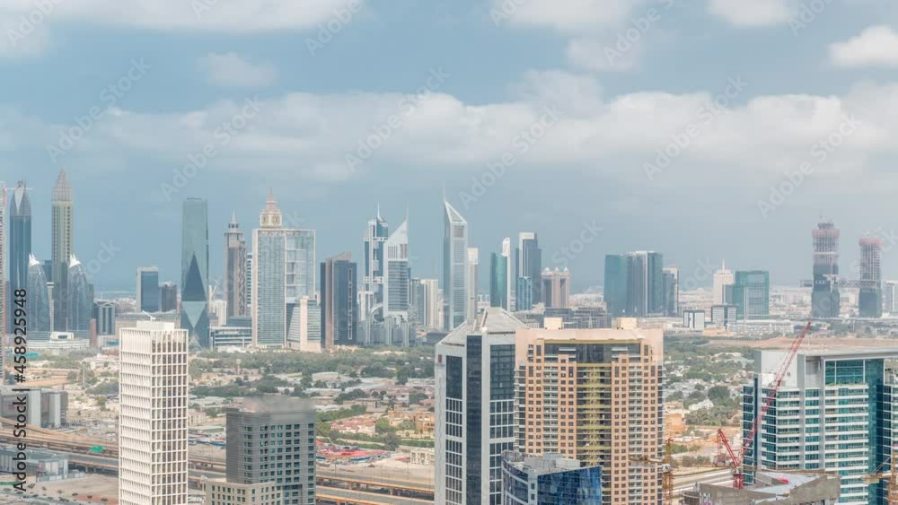 Rows of skyscrapers in financial district and business bay in Dubai aerial timelapse. Rows of skyscrapers in financial district and business bay in Dubai aerial timelapse.
