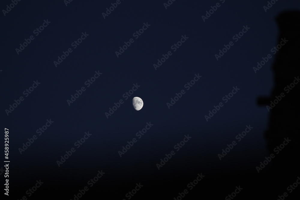 full moon in the night sky moon in blue hour time on the sky moon gets glowing during blue hour full moon in the night sky moon in blue hour time on the sky moon gets glowing during blue hour