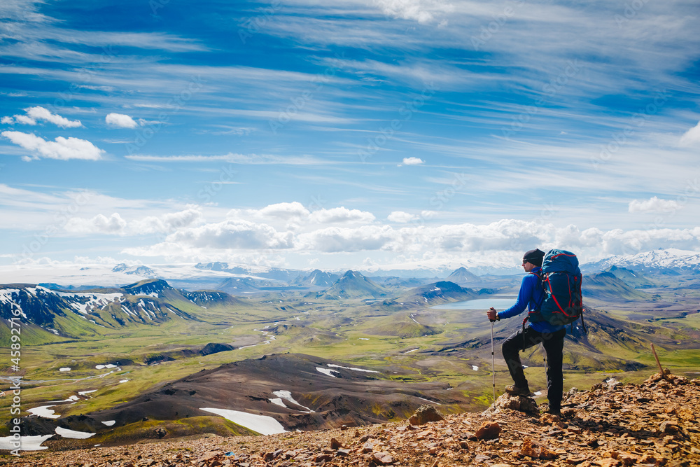 Active hiker enjoying the view on the trail in Landmannalaugar, Iceland
