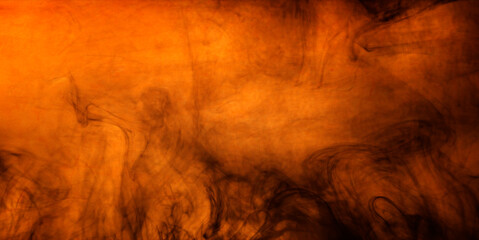 Halloween background with orange texture and scary black smoke swirls. Spooky halloween design backdrop design.