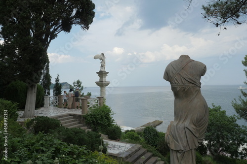 View of scenic seascape in Black sea from Aivazovsky parc with marble statues, Crimea