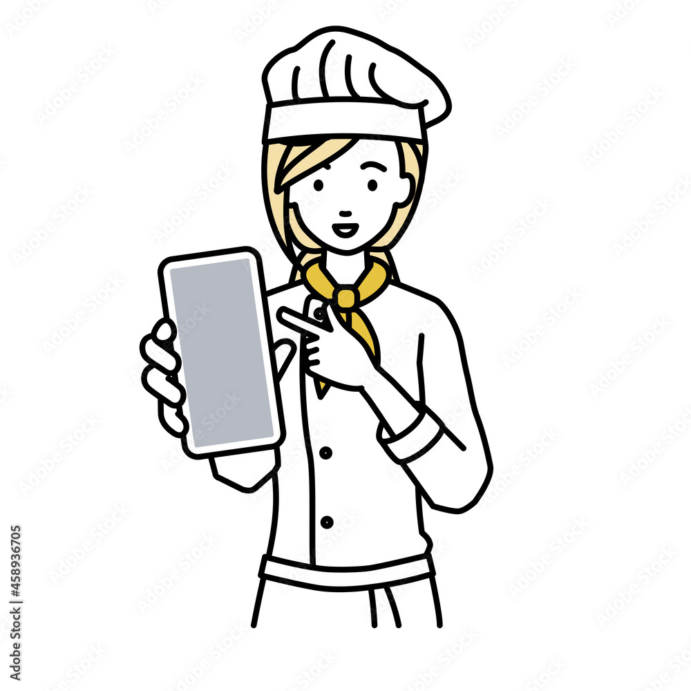 立ってスマートフォンを指差してこちらに向けて見せている調理師の女性
