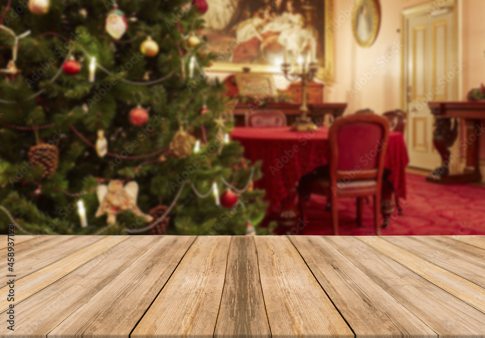 Obraz premium Wooden board empty table top on of blurred background. Christmas concept
