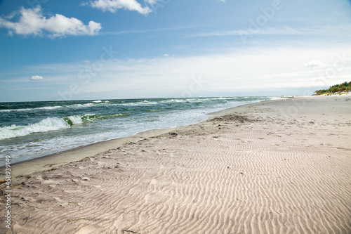 Summer landscape. A lonely beach with white sand and blue sea. View of Baltic sea coast.  Hel  Peninsula  Pomerania  Poland