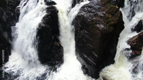 Black Linn Falls at The Hermitage in Dunkeld, Scotland. This waterfall is best viewed from Ossian’s Hall, deep within the Douglas Fir forest. photo