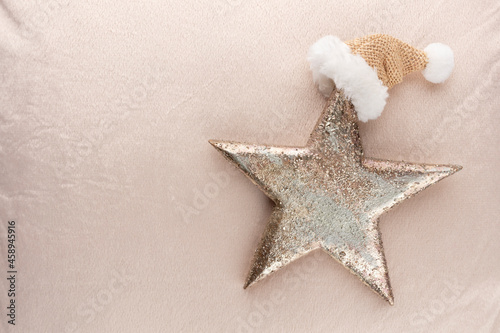 Golden christmas stars with wool background.